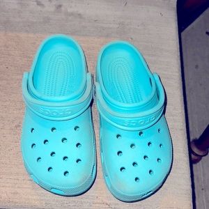 Teal crocs
